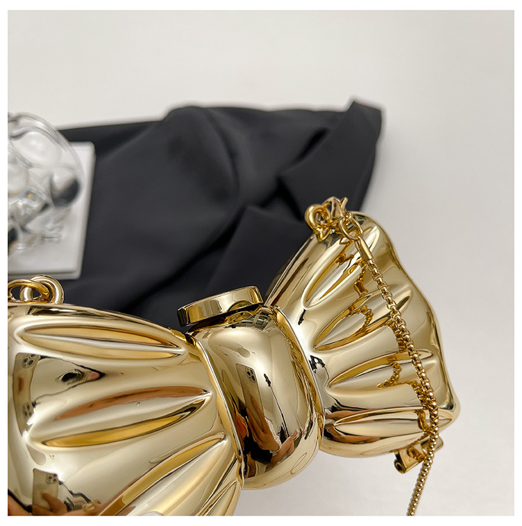Glanzende gouden metalen strik - Luxury Bags Mini recensie en prijs